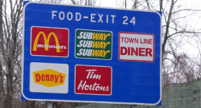 highway food exit sign