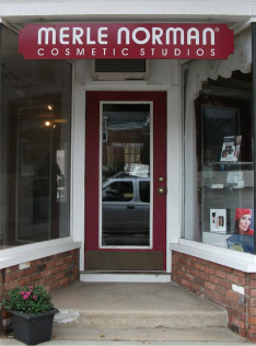 Merle Norman Cosmetic Studios sign